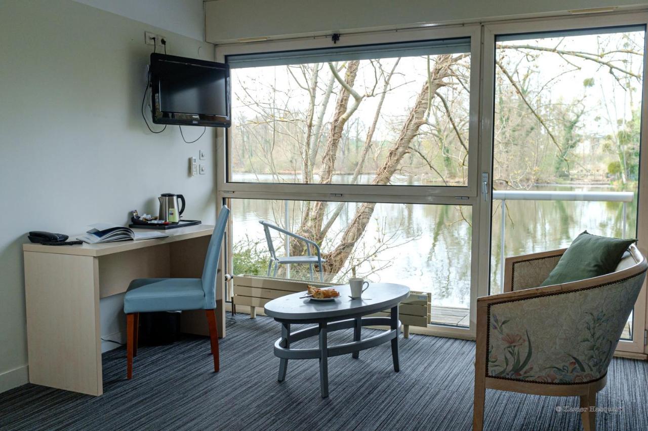 Hotel L'Ile Du Saussay Итвиль Экстерьер фото
