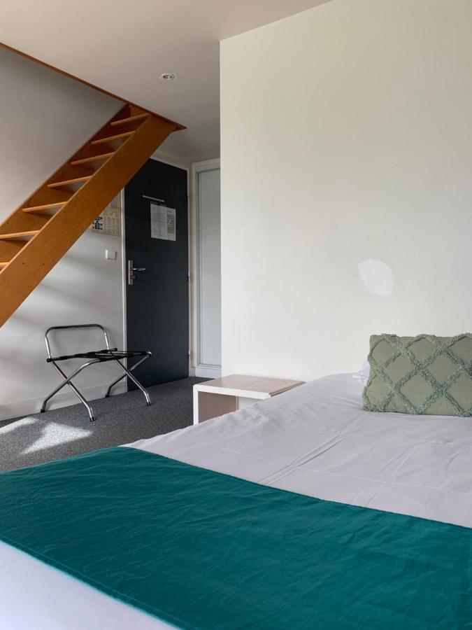 Hotel L'Ile Du Saussay Итвиль Экстерьер фото
