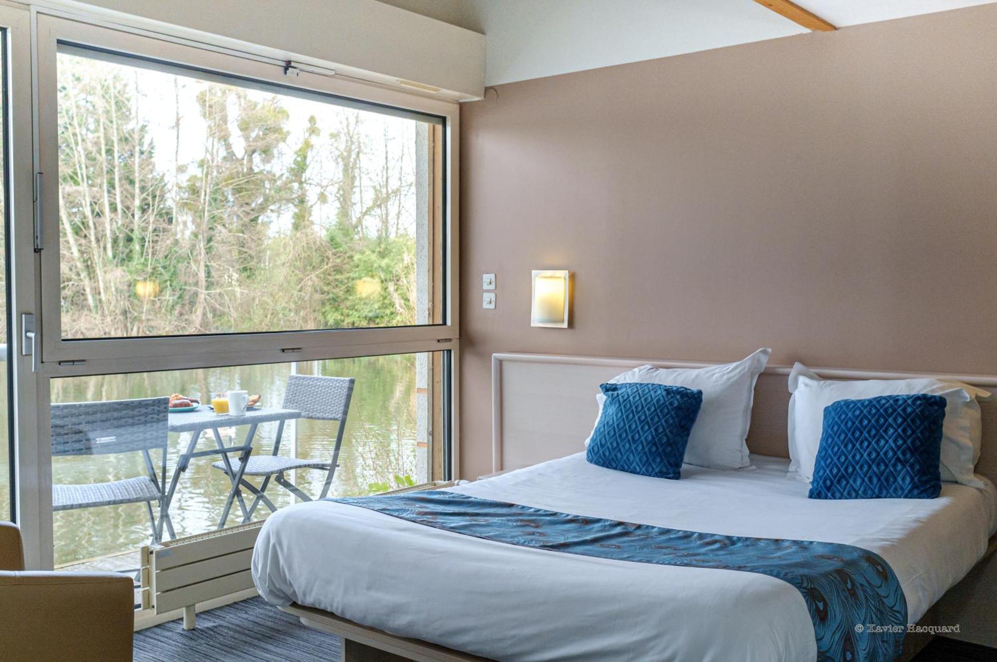 Hotel L'Ile Du Saussay Итвиль Экстерьер фото